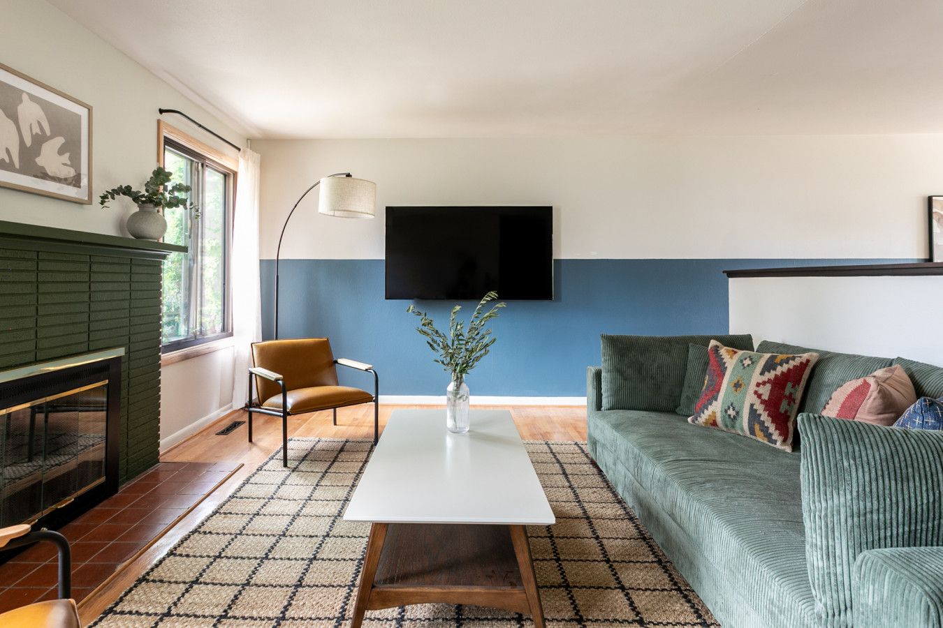 Living room with sky blue painted lower walls